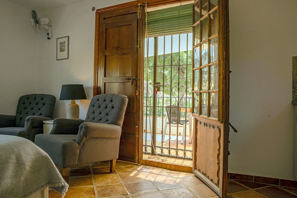 Sitting area and terrace doors in Rigoletto